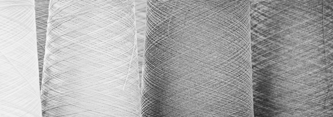 Black and white reels of threads